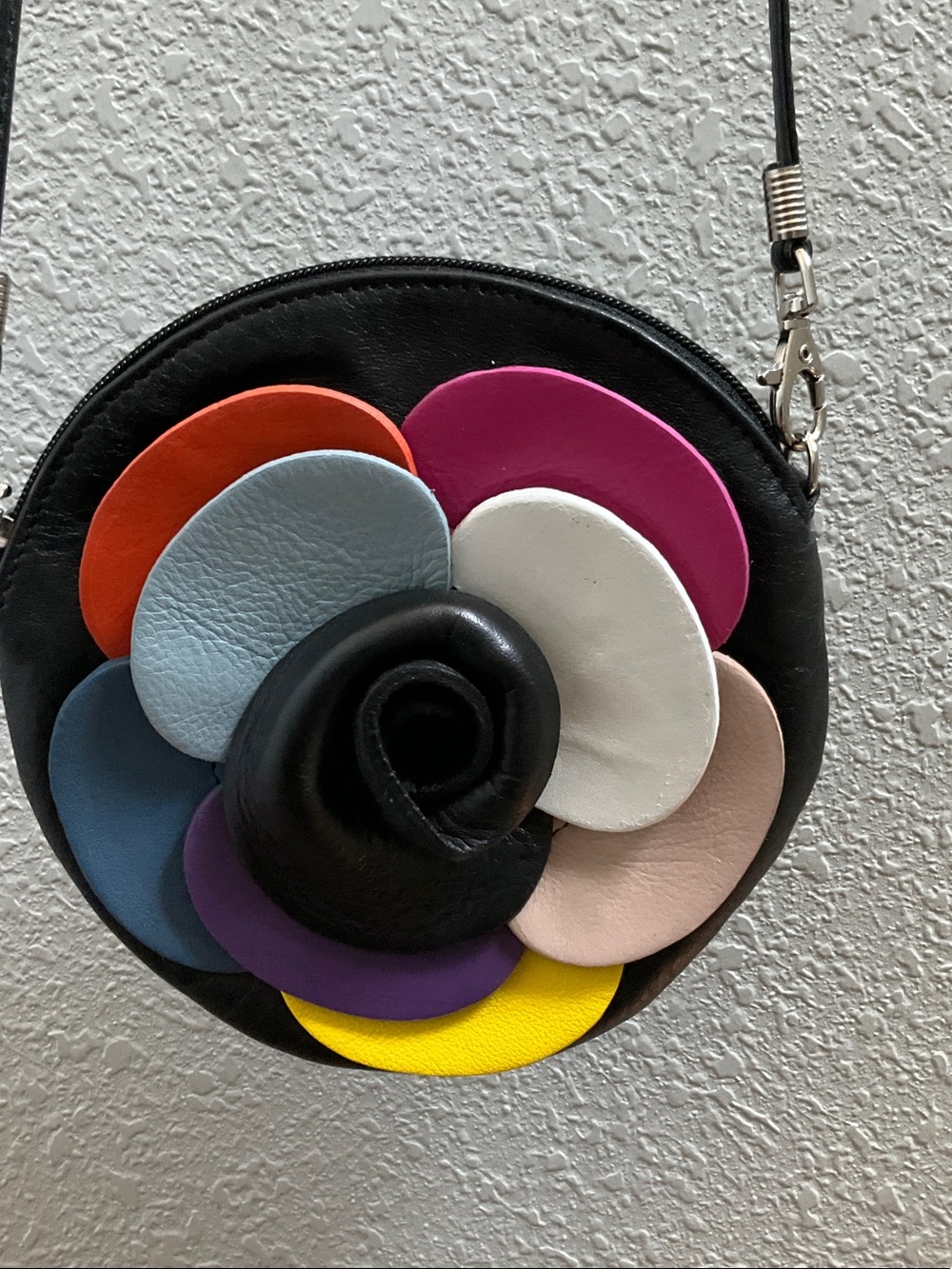 Leather crossbody with leather flower.Made in Italy